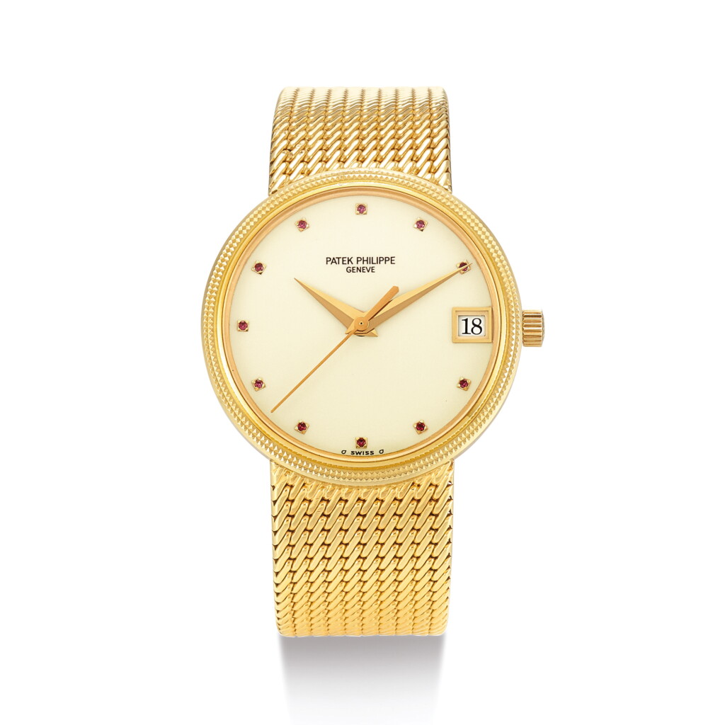 View full screen - View 1 of Lot 2224. PATEK PHILIPPE | CALATRAVA, REFERENCE 3802/205 A YELLOW GOLD AND RUBY-SET BRACELET WATCH WITH DATE, CIRCA 1983 " | 百達翡麗 | Calatrava 型號3802/205 黃金鑲紅寶石鏈帶腕錶,備日期顯示,機芯編號1914614,錶殼編號2959389,約1983年製".