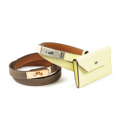 View full screen - View 1 of Lot 430. Set of Two : Jaune Milton Epsom Kelly Pocket Belt Palladium Hardware, 2024 and Etoupe Epsom Kelly Belt Rose Gold Hardware, 2024.