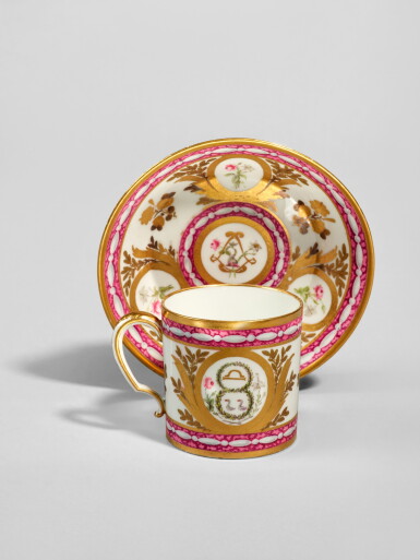 View full screen - View 1 of Lot 211. A Sèvres (Hard-Paste) Porcelain Faux Marbre-Ground 'Dauphin' Cup and Saucer (gobelet litron et soucoupe), circa 1781.