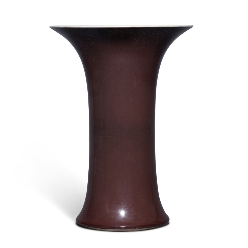 View full screen - View 1 of Lot 18. An incised aubergine-glazed beaker vase, Qing dynasty, 18th century.