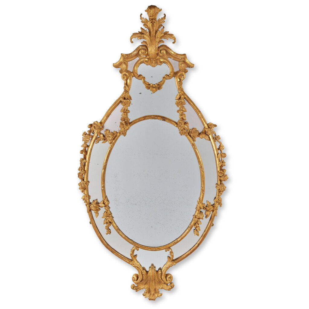 View full screen - View 1 of Lot 105. A George III Giltwood Oval Mirror, Circa 1765.