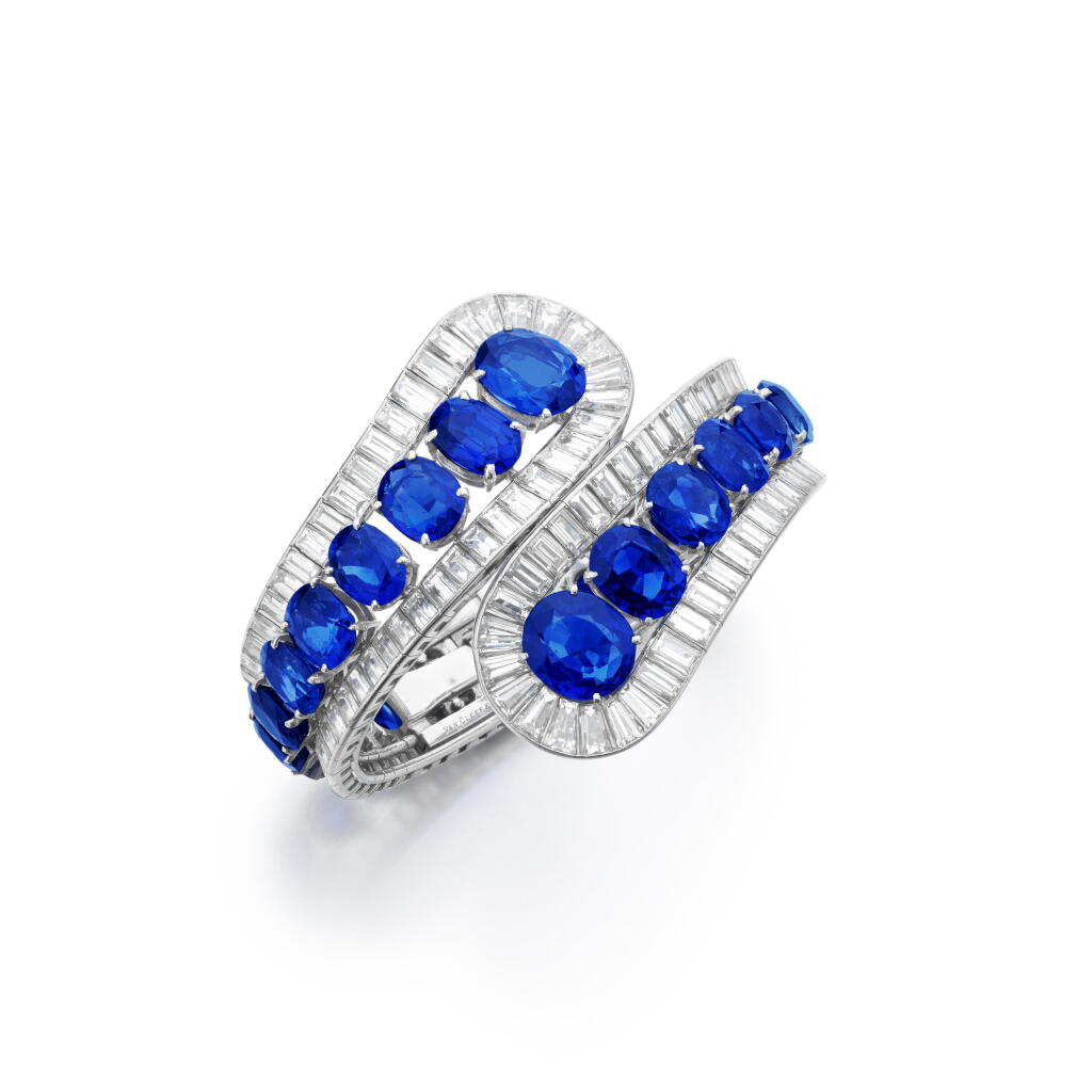 View full screen - View 1 of Lot 589. Attractive sapphire and diamond bangle, circa 1950.