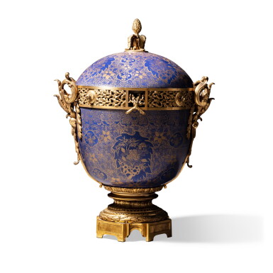View full screen - View 1 of Lot 233. A monumental Louis XVI style gilt-bronze mounted Chinese blue and gilt porcelain covered pot-pourri, late 19th century | Grand vase pot-pourri en porcelaine de Chine bleu poudré or et monture de bronze doré de style Louis XVI, fin XIXe siècle.