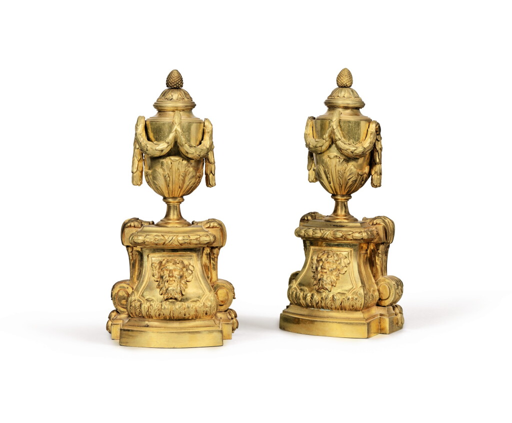 View full screen - View 1 of Lot 145. A PAIR OF LOUIS XVI GILT-BRONZE FIREDOGS | PAIRE DE CHENETS EN BRONZE REDORÉ D'ÉPOQUE LOUIS XVI.