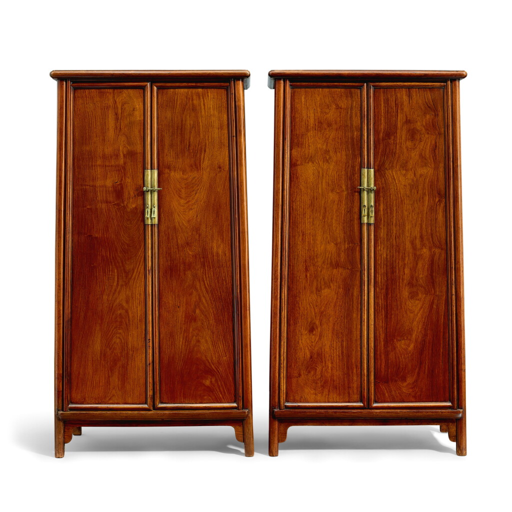 View full screen - View 1 of Lot 19. A pair of huanghuali round-cornered tapered cabinets, yuanjiaogui Late Ming – early Qing dynasty | 明末至清初 黃花梨圓角櫃成對.