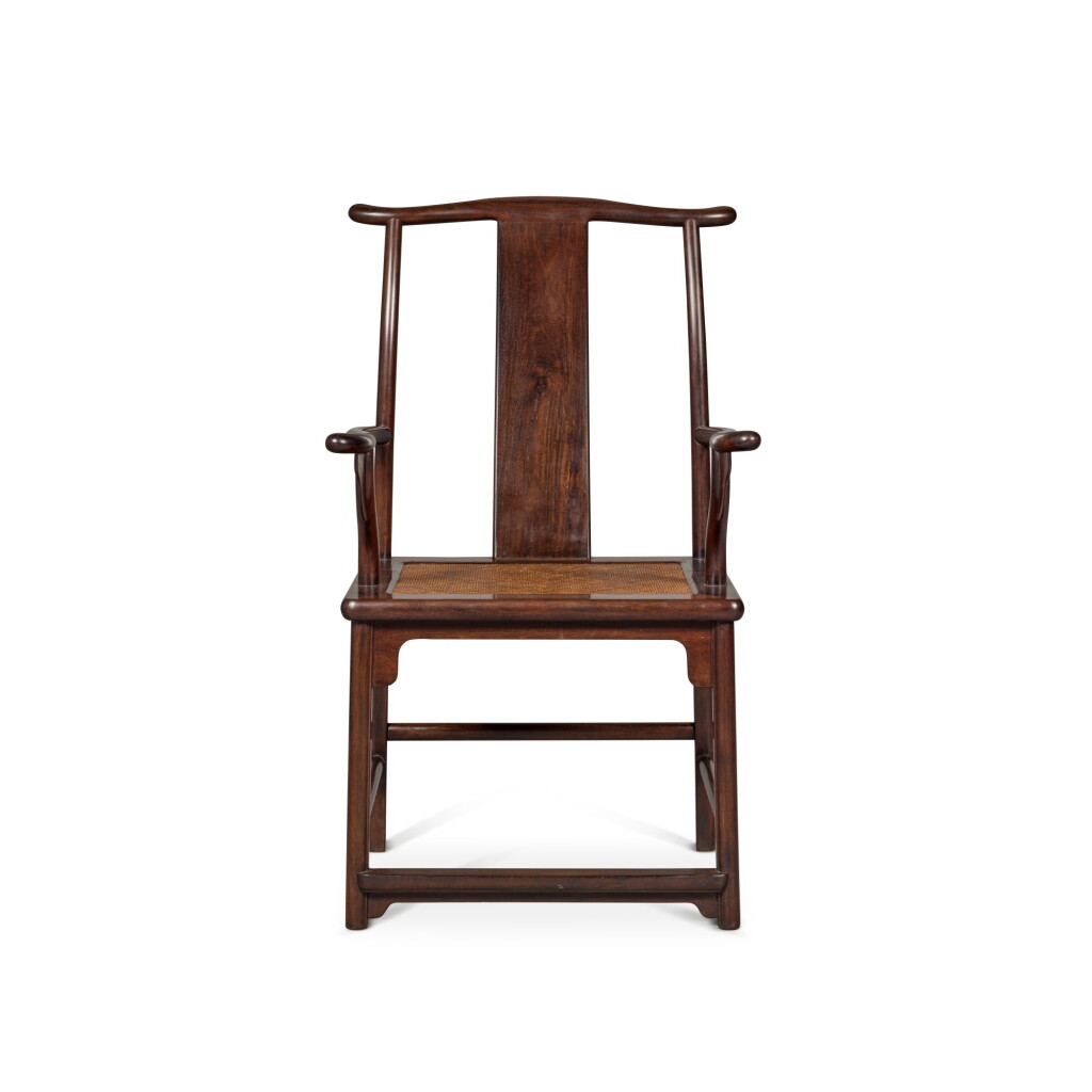 View full screen - View 1 of Lot 377. A ‘zitan’ yokeback armchair (Sichutou guanmaoyi), Qing dynasty, 18th / 19th century | 清十八 / 十九世紀 紫檀四出頭官帽椅.