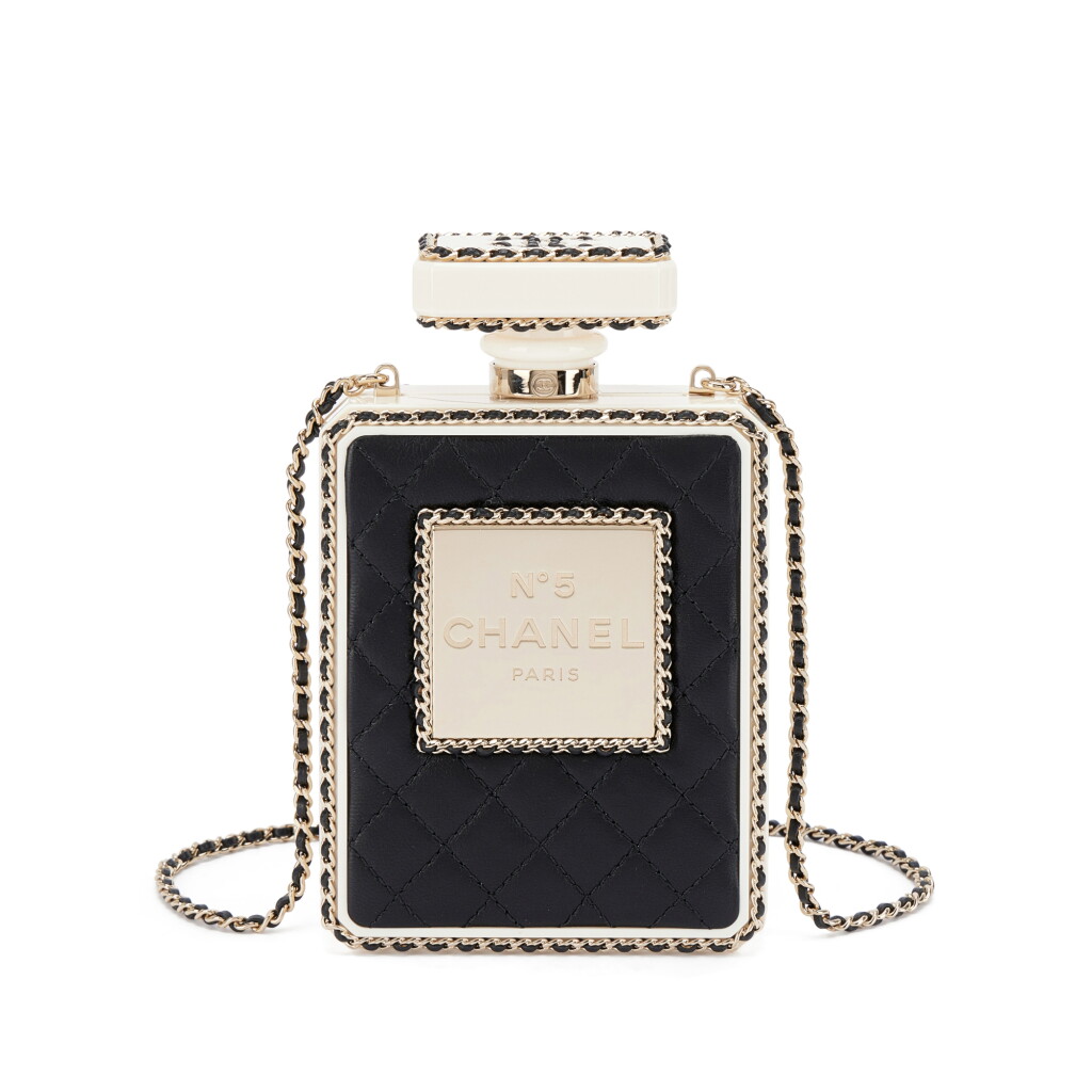 View full screen - View 1 of Lot 641. Limited Edition Black Quilted Calfskin and White Plexiglass Perfume Bottle Minaudiere Pale Gold Hardware.