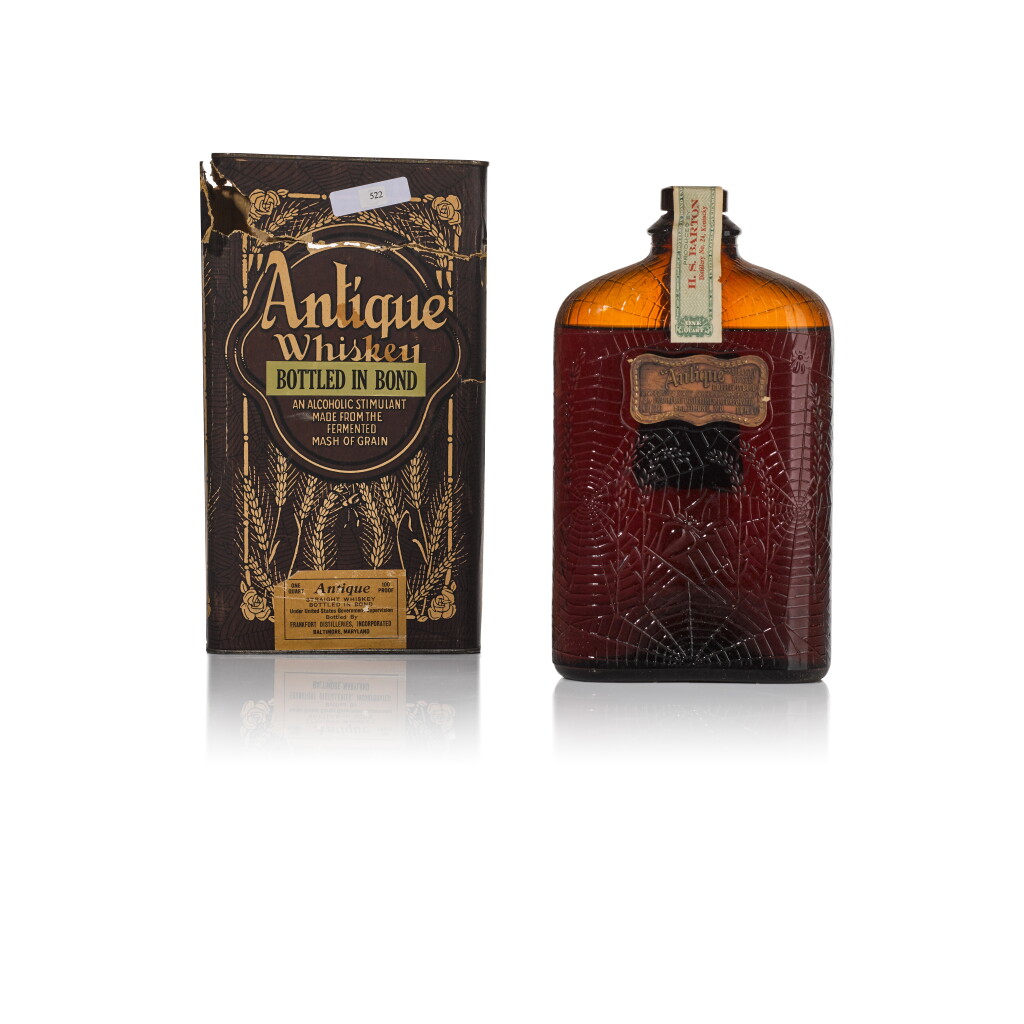 View full screen - View 1 of Lot 522. Antique Straight Whiskey 100 Proof 1917 (1 QTBT).