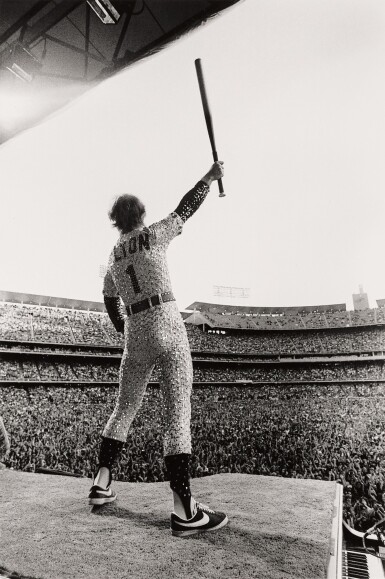 View full screen - View 1 of Lot 11. Elton John, Dodger Stadium, Los Angeles, October 1975.