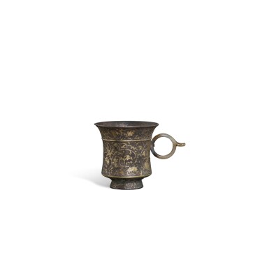 View full screen - View 1 of Lot 3569. A parcel-gilt silver 'floral and bird' cup, Tang dynasty | 唐 局部銀鎏金鏨刻花鳥紋盃.