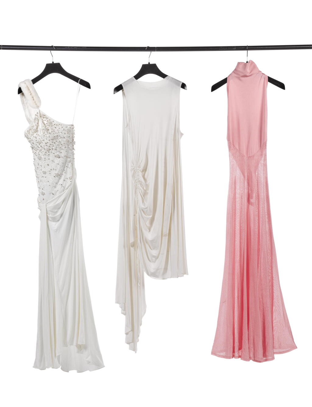 View full screen - View 1 of Lot 46. Alaïa Long Pink See-Through Turtleneck Dress with Bodysuit, White Mini Dress with Gathered Details and White Veil and, an Off White Halter Dress with Sequin and Faux Fur Embellishments and a Gathered Waist.