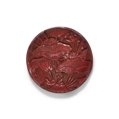 View full screen - View 1 of Lot 31. A carved cinnabar lacquer 'lotus' box and cover, Ming dynasty, 16th century | 明十六世紀 剔紅荷塘紋印盒.