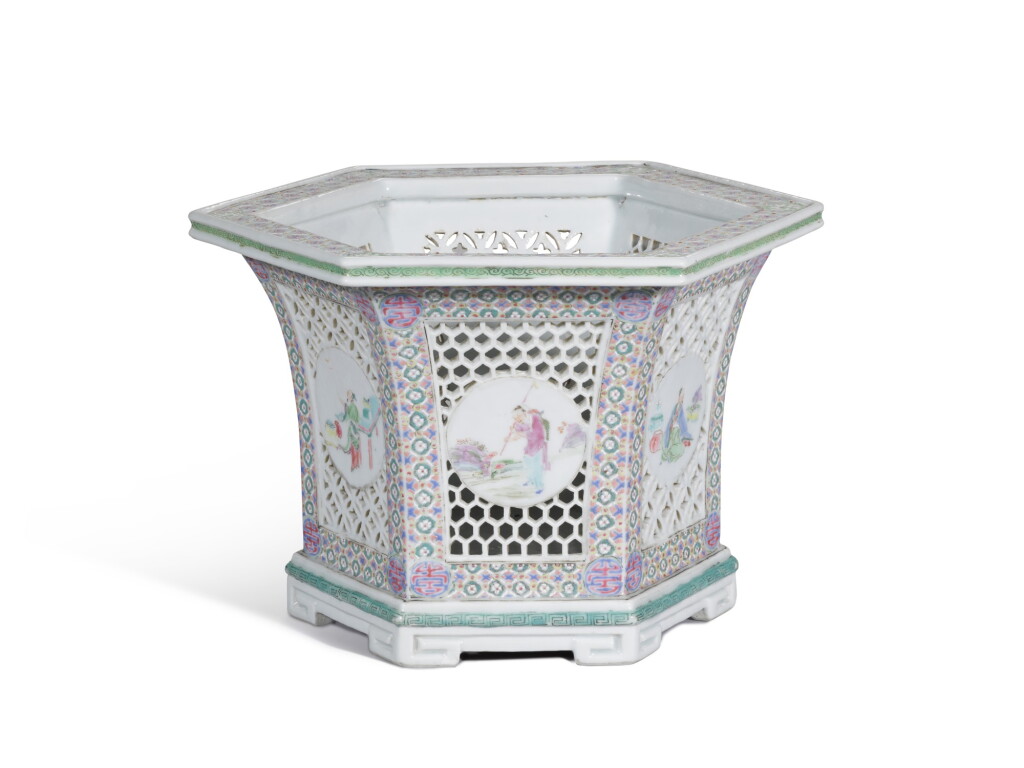 View full screen - View 1 of Lot 58. A famille-rose hexagonal openwork jardiniere, Qing dynasty, Yongzheng period | 清雍正 粉彩鏤雕高士圖六棱花盆.