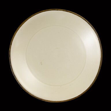 View full screen - View 1 of Lot 23. A Dingyao 'lotus' dish Song dynasty | 宋 定窰白釉蓮瓣紋盤 .
