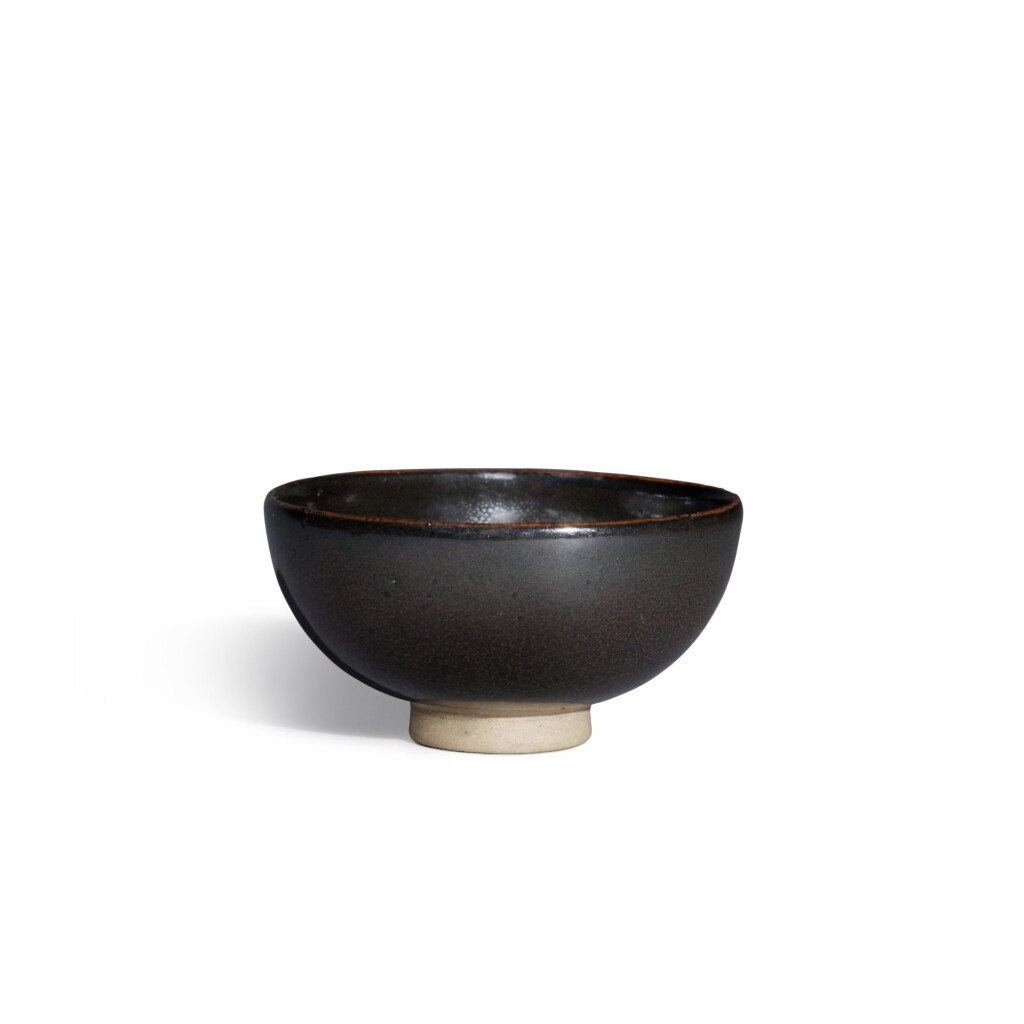 View full screen - View 1 of Lot 131. A small 'oil spot' bowl, Northern Song / Jin dynasty | 北宋 / 金 黑釉油滴小盞.