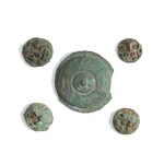 A group of five archaic bronze discs, Western Zhou dynasty | 西周 青銅馬飾一組五件