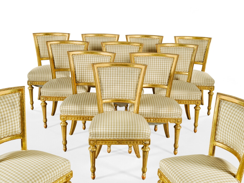 View full screen - View 1 of Lot 26. A SET OF TWELVE ITALIAN CARVED GILTWOOD NEO-CLASSICAL CHAIRS, ROMAN, LATE 18TH CENTURY.