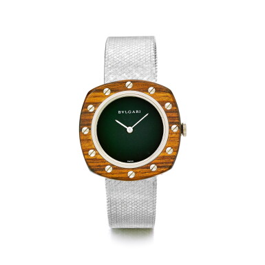 View full screen - View 1 of Lot 840. BULGARI | AN UNUSUAL WHITE GOLD BRACELET WATCH WITH ONYX DIAL AND WOODEN BEZEL, CIRCA 1970 | 寶格麗 | 白金鍊帶腕錶備黑瑪瑙錶盤及木錶圈,年份約1970.