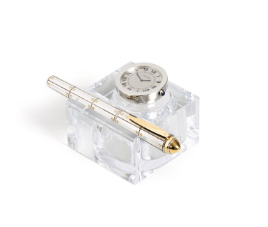 View full screen - View 1 of Lot 290. Crystal and stainless steel inkwell-clock, and silver and gold fountain pen, 'Santos'.