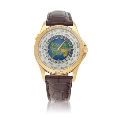 View full screen - View 1 of Lot 493. 'Geneva Seal' World Time, Ref. 5131J-001 Yellow gold world time wristwatch with cloisonné enamel dial depicting a map of the Americas, Europe and Africa Circa 2009.