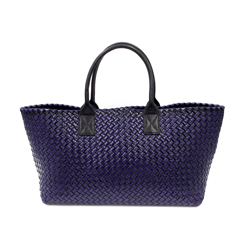 View full screen - View 1 of Lot 716. BOTTEGA VENETA | PATENT PURPLE CABAT MM IN INTRECCIATO NAPPA, 2009.