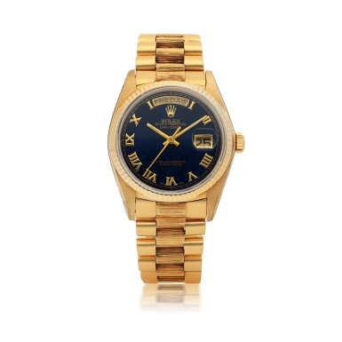 View full screen - View 1 of Lot 203. ROLEX | DAY-DATE, REF 18038 YELLOW GOLD WRISTWATCH WITH DAY, DATE, BRACELET AND BLUE HARDSTONE DIAL CIRCA 1978.