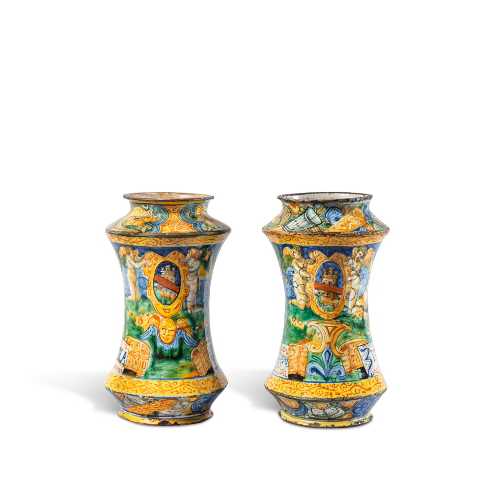 View full screen - View 1 of Lot 71. A pair of Italian maiolica armorial albarelli, Castel Durante, workshop of Angelo and Ludovico Picchi, circa 1562-1563.