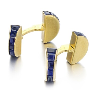 View full screen - View 1 of Lot 1199. Pair of gold and sapphire cufflinks.