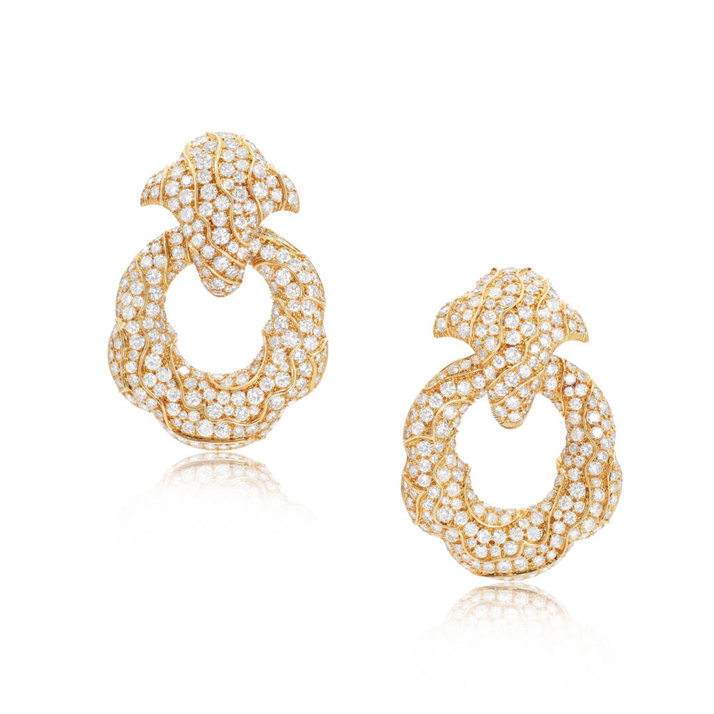 View full screen - View 1 of Lot 1190. Pair of diamond pendent ear clips, 'Esclave', circa 1980.
