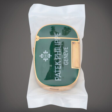 View full screen - View 1 of Lot 250. Golden Ellipse, Reference 9508 | A yellow gold and green enamel lighter | Circa 1980.