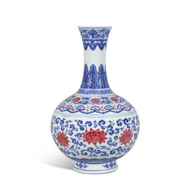 View full screen - View 1 of Lot 22. An exceptionally rare underglaze-blue and puce-enamelled 'lotus' bottle vase, Seal mark and period of Qianlong.