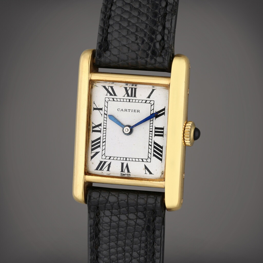 View full screen - View 1 of Lot 267. Tank Louis | A yellow gold rectangular wristwatch, Circa 1980.