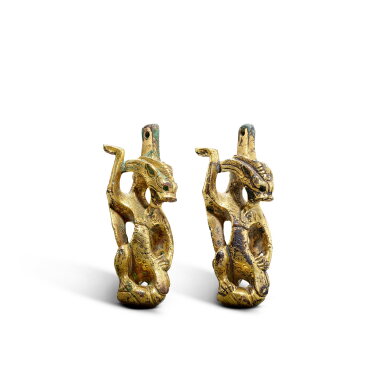 View full screen - View 1 of Lot 755. A rare pair of gilt-bronze 'dragon' fittings, Western Han dynasty | 西漢 銅鎏金龍形飾件一對.
