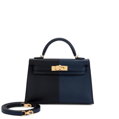 View full screen - View 1 of Lot 6095. Limited Edition Bleu Indigo, Black Epsom and Rouge Grenat Casaque Mini Kelly II 20 Gold Hardware, 2021.