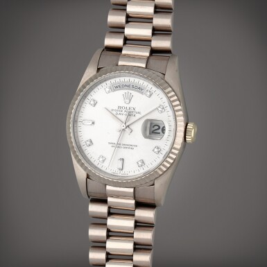 View full screen - View 1 of Lot 211. Day-Date, Reference 18239 | A white gold and diamond-set wristwatch with day, date and bracelet | Circa 1995.