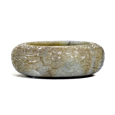 View full screen - View 1 of Lot 262. A grey jade 'dragon' brushwasher, Qing dynasty, Qianlong period | 清乾隆 灰玉雲龍紋洗.