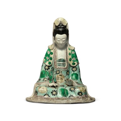 View full screen - View 1 of Lot 111. A famille-verte glazed biscuit figure of Guanyin, Qing dynasty, Kangxi period.