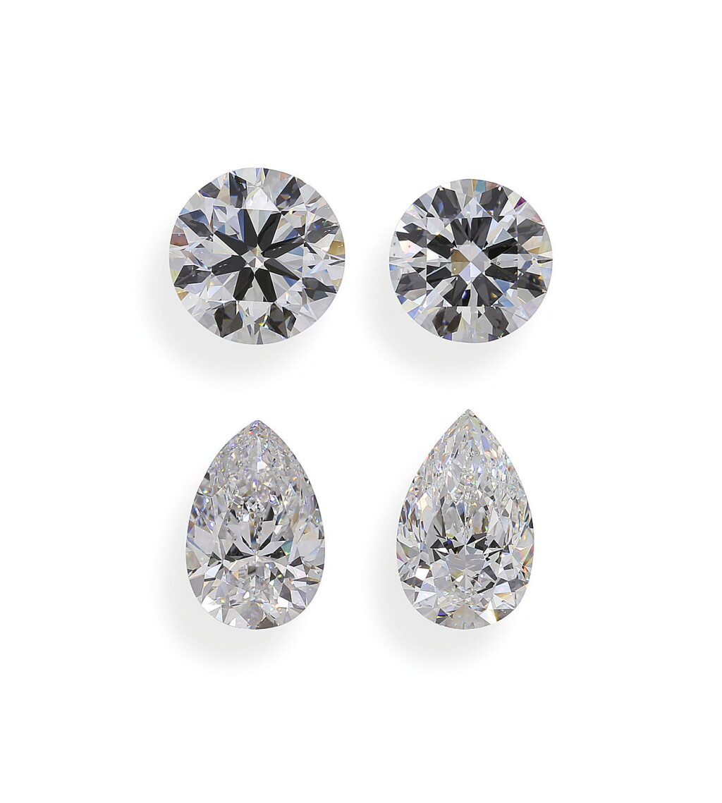 View full screen - View 1 of Lot 3. A Group of 4 Pear-Shaped and Round Diamonds.
