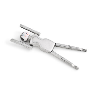 View full screen - View 1 of Lot 59. A pair of silver 'Dutch Doll' sugar tongs, Cohen & Charles, London 1922.