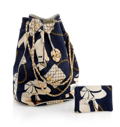 View full screen - View 1 of Lot 182. CHANEL | PRINTED CANVAS AND WHITE LEATHER WITH GOLD-TONE METAL BUCKET SHOULDER BAG AND TWO MULTICOLOR GRIPOIX CUFFS .
