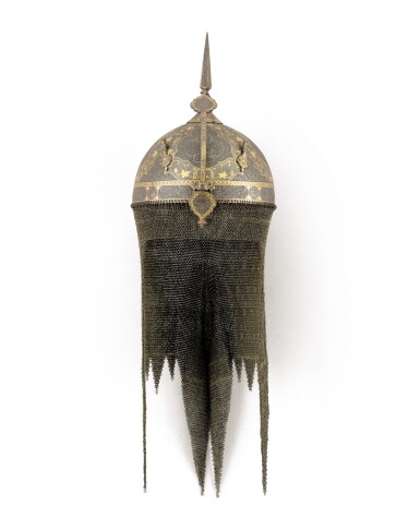 View full screen - View 1 of Lot 137. A gold and silver-overlaid steel helmet (kulah khud) with grape vines, Persia, Qajar, 19th century.