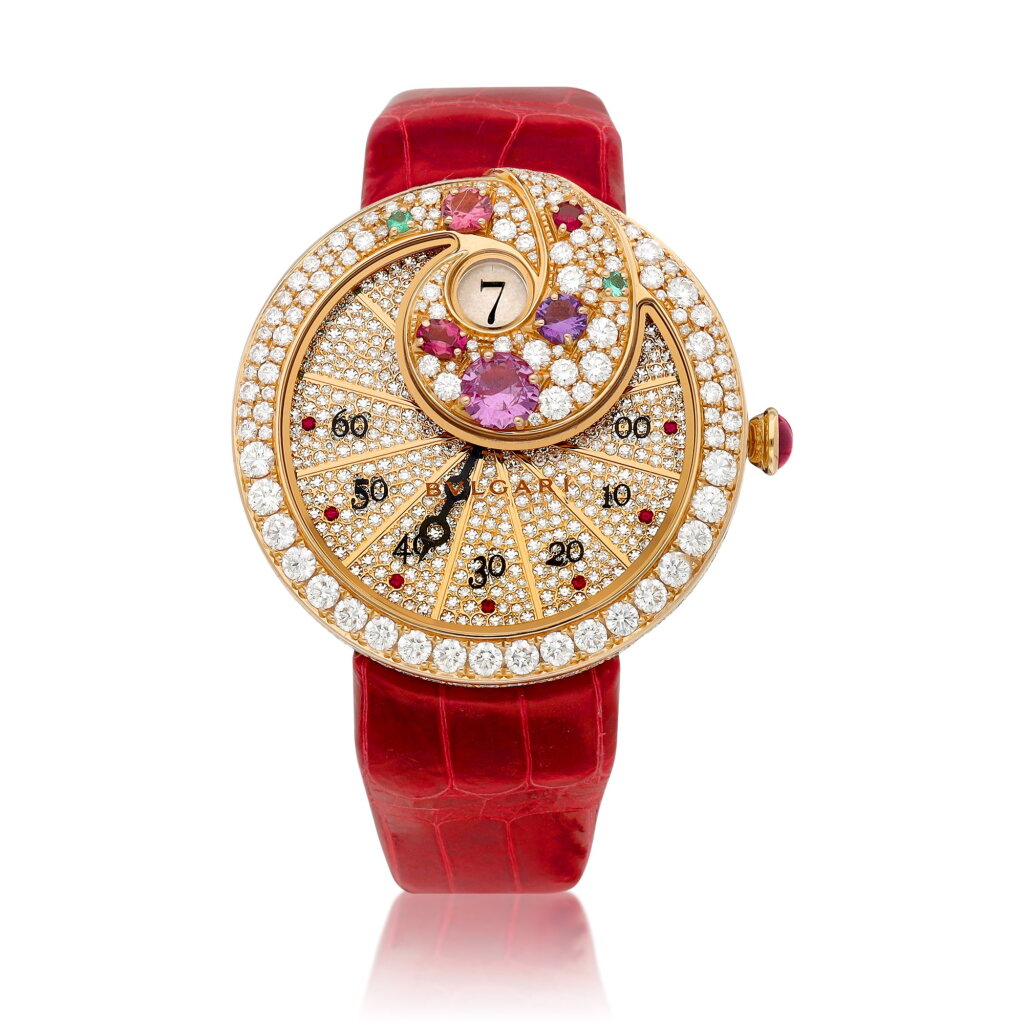 View full screen - View 1 of Lot 8616. Berries, Reference BE P 40 G R | A pink gold, diamond and multi-gem-set jumping hours wristwatch with retrograde minutes, Circa 2019 | 寶格麗 | Berries 型號BE P 40 G R | 粉紅金鑲鑽石及多彩寶石跳時腕錶,備逆跳分鐘,約2019年製.