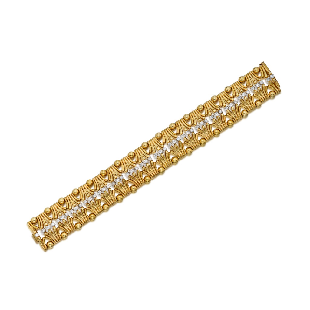 View full screen - View 1 of Lot 528. Gold and Diamond 'Hands' Bracelet.