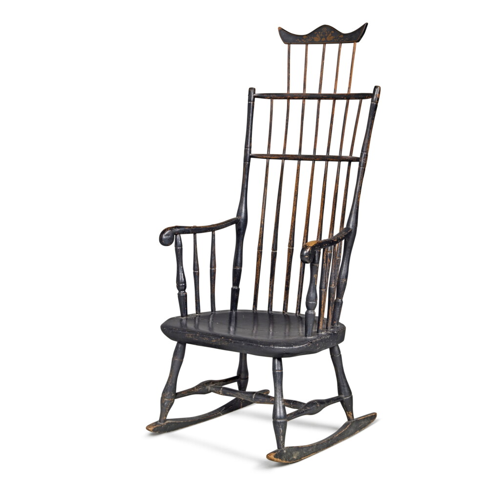 View full screen - View 1 of Lot 302. Black-Painted and Oil-Gilt-Stencil-Decorated Rod-Back Windsor Rocking Armchair, Pennsylvania, Circa 1810.