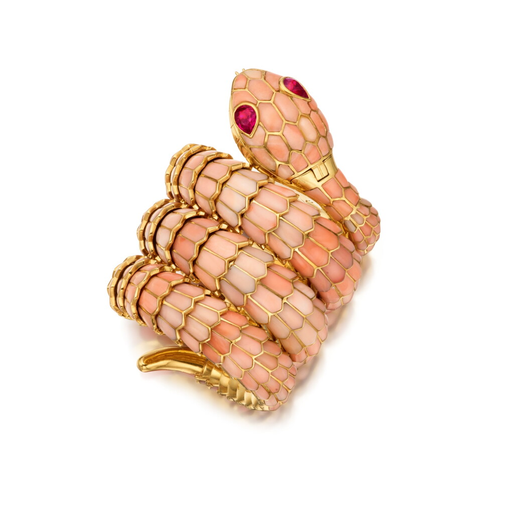View full screen - View 1 of Lot 129. Bulgari | Gold, Coral and Ruby 'Serpenti' Bracelet-Watch 寶格麗 黃金鑲珊瑚及紅寶石「Serpenti」手鏈腕錶.