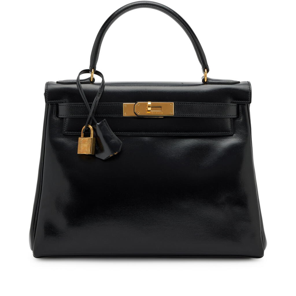 View full screen - View 1 of Lot 139. Vintage Black Box Retourne Kelly 28 Gold Hardware, 1984.
