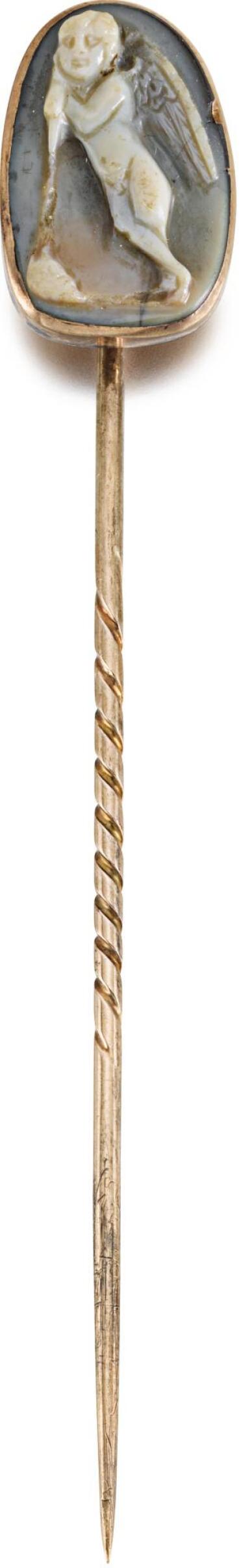 View full screen - View 1 of Lot 77. PROBABLY ROMAN, 2ND-3RD CENTURY | PIN WITH A CAMEO OF CUPID AS THANATOS.