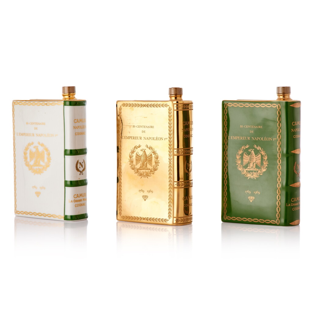 View full screen - View 1 of Lot 676. Camus Napoleon Book Decanter 40.0 abv NV (3 BT35).