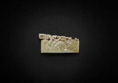 View full screen - View 1 of Lot 3833. A pale celadon jade 'chilong' scabbard slide, Early Western Han dynasty | 西漢早期 淺青白玉螭龍紋劍璏.
