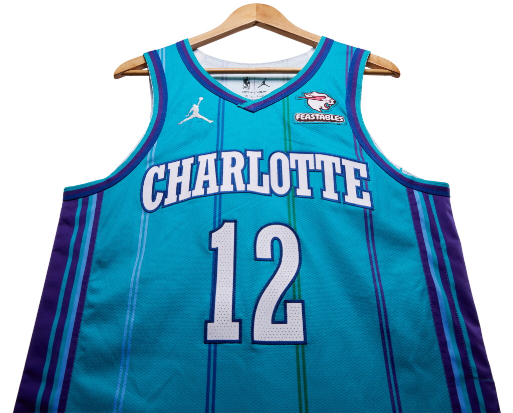 View full screen - View 1 of Lot 83. Leaky Black Charlotte Hornets 2023-2024 Kia NBA Tip-Off Game Worn Classic Edition Jersey.